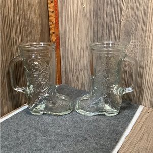 Pair of glass cowboy drink mugs